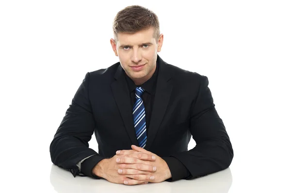 Smart young business executive at his work desk — Stock Photo, Image