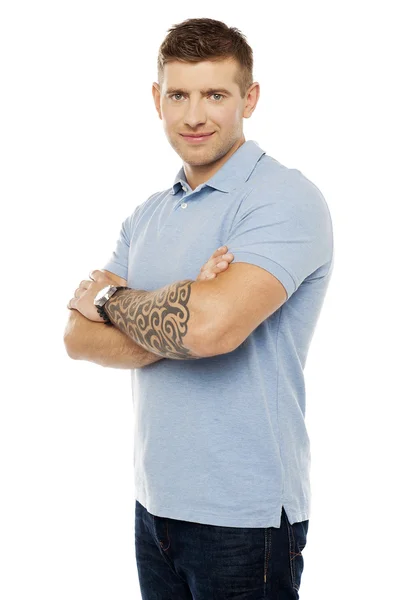 Smiling young man posing in style — Stock Photo, Image