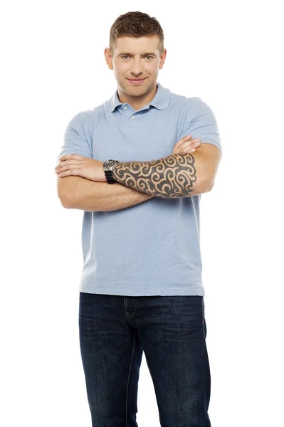 Casual man with artistic tattoo drawn on hand — Stock Photo, Image