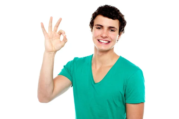 Cheerful young boy showing perfect sign — Stock Photo, Image