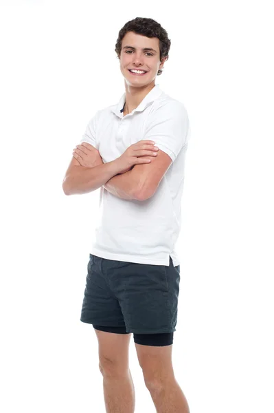 Cute guy posing with crossed arms — Stock Photo, Image