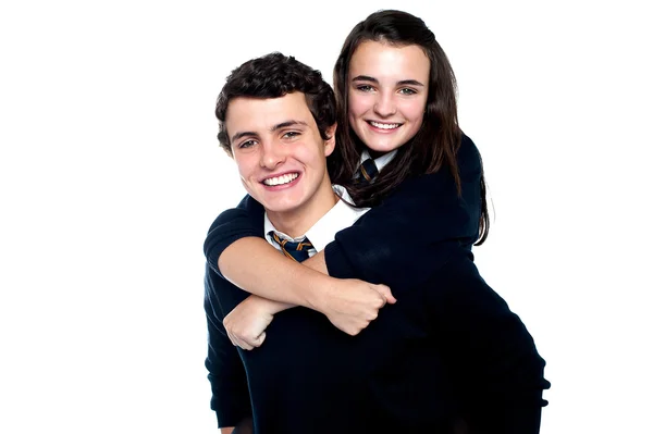 Jovem menina em seus amigos de volta, desfrutando de passeio porquinho — Fotografia de Stock