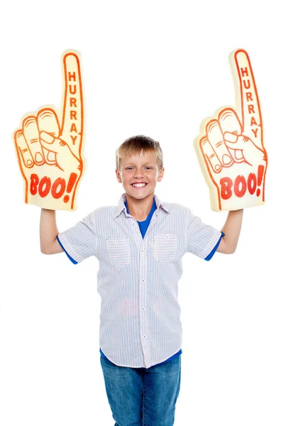 Energetic young boy showing true fan spirit — Stock Photo, Image