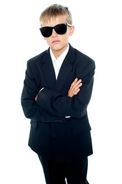 Snapshot of young kid wearing suit and sunglasses — Stock Photo, Image