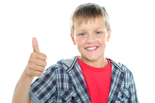 Boy in trendy clothes showing thumbs up sign — Stock Photo, Image