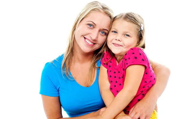 Adorable mom and daughter posing together — Stock Photo, Image
