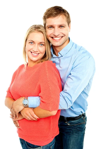 Husband embracing his gorgeous wife from behind — Stock Photo, Image
