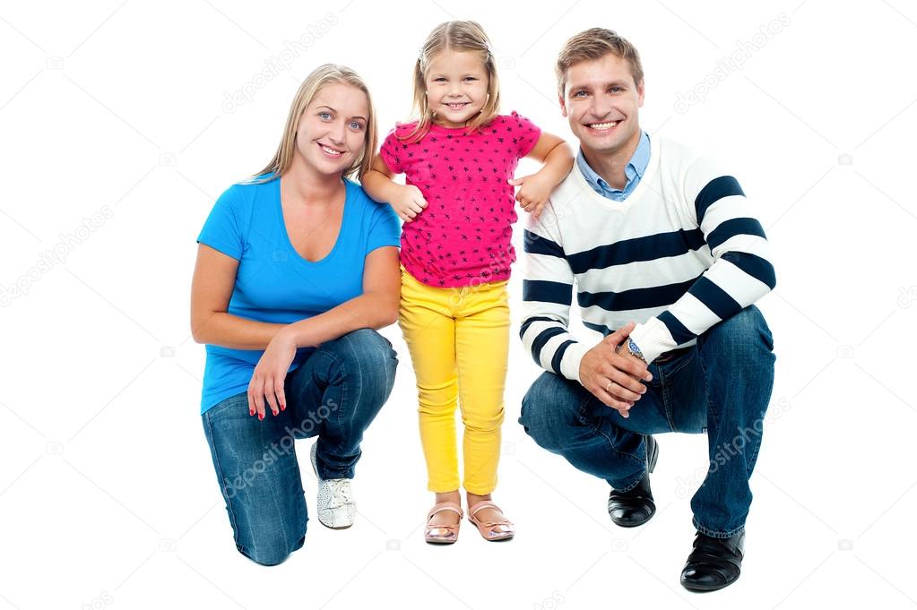 Studio portrait of charming young family