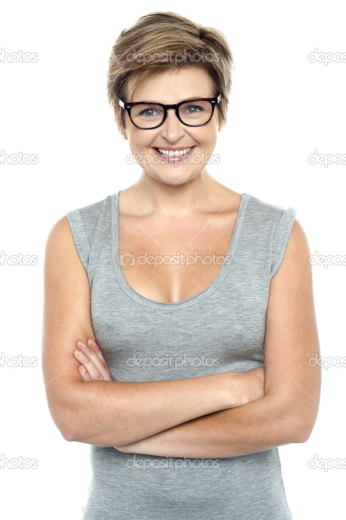 Bespectacled lady posing with confidence