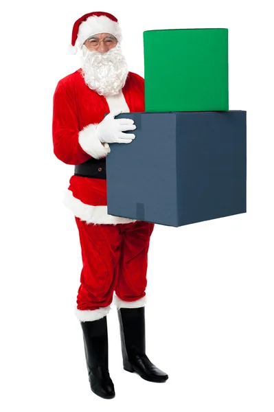 Zdjęcie szczęśliwy santa Claus dostarczanie prezentów — Zdjęcie stockowe