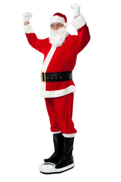 Santa vrhá drahocenné liber! — Stock fotografie