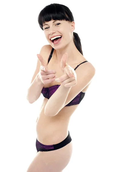 Pretty brunette in bikini gesturing gotcha — Stock Photo, Image
