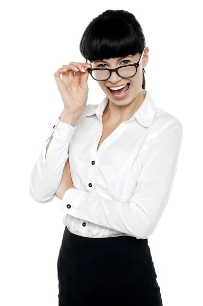 Cheerful business lady checking you out — Stock Photo, Image