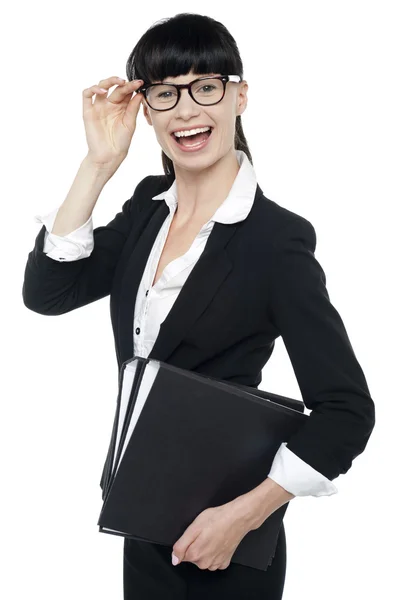 Cheerful female secretary carrying business files — Stock Photo, Image