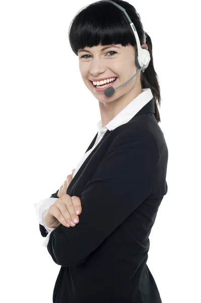 Amigável operadora de telefonia feminina ao seu serviço — Fotografia de Stock