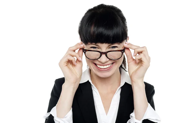 Cheerful woman taking off her spectacles — Stock Photo, Image