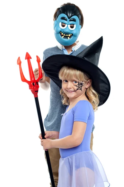 Young brother and sister in halloween costume — Stock Photo, Image