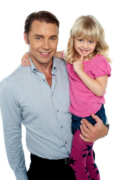 Cute little daughter being carried by her father — Stock Photo, Image