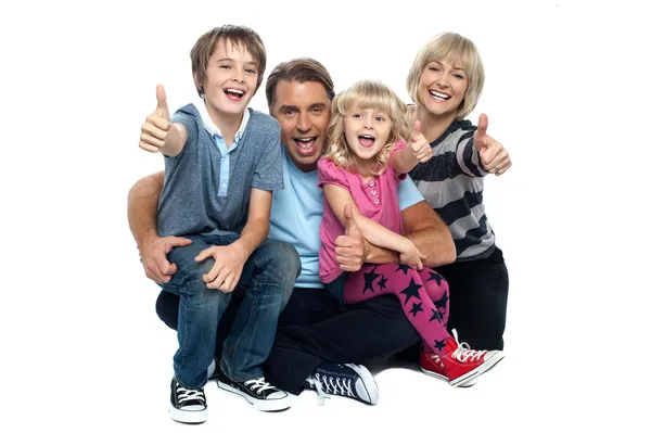 Cheerful thumbs up family — Stock Photo, Image