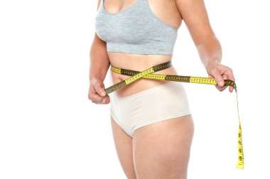 kadın iç çamaşırı bir inç bant ile poz'ın