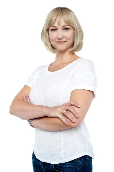 Confident woman in trendy wear with arms folded — Stock Photo, Image