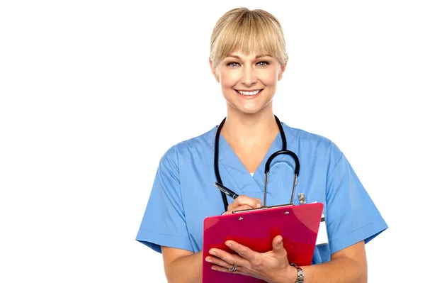 Shot of a cheerful doctor doing her rounds — Stock Photo, Image