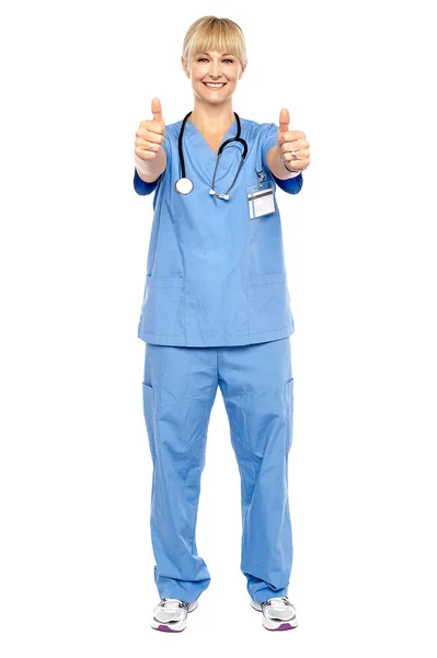 Cheerful lady doctor showing double thumbs up — Stock Photo, Image