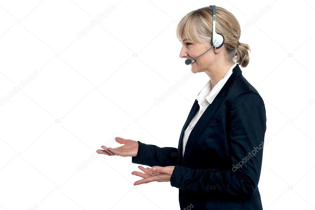 Female customer care agent in a conversation