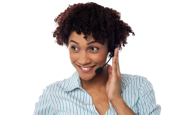 Casual shot of a call centre executive looking away — Stock Photo, Image