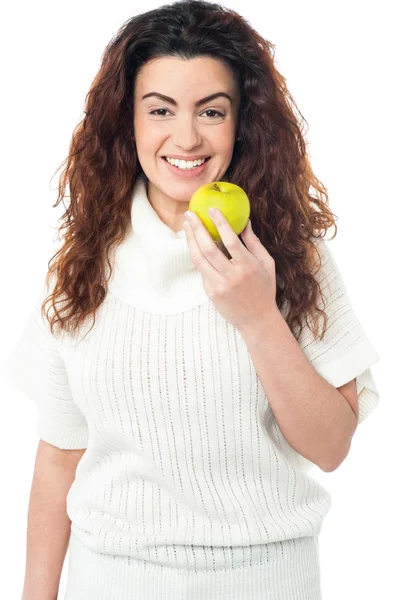 Elegant woman holding fresh green apple — Stock Photo, Image