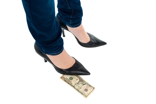 Woman in stilettos standing over ten dollar note — Stock Photo, Image