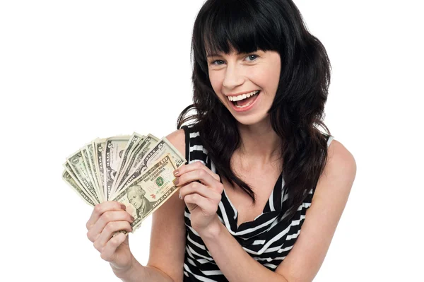 Attractive young woman holding money — Stock Photo, Image