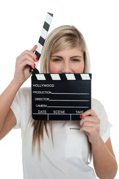 Beautiful female with clapperboard. It's showtime. — Stock Photo, Image