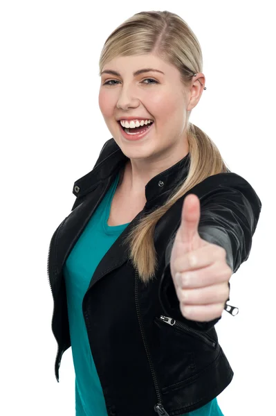 Joyful blonde teen gesturing thumbs up — Stock Photo, Image