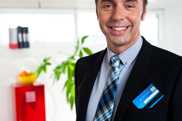 Entrepreneur with credit card in his blazer pocket — Stock Photo, Image