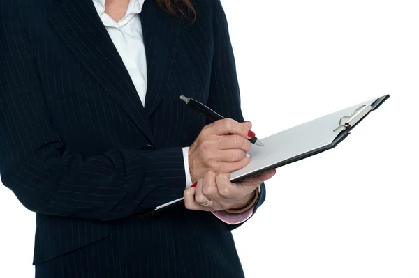 Cropped image of female secretary taking notes — Stock Photo, Image