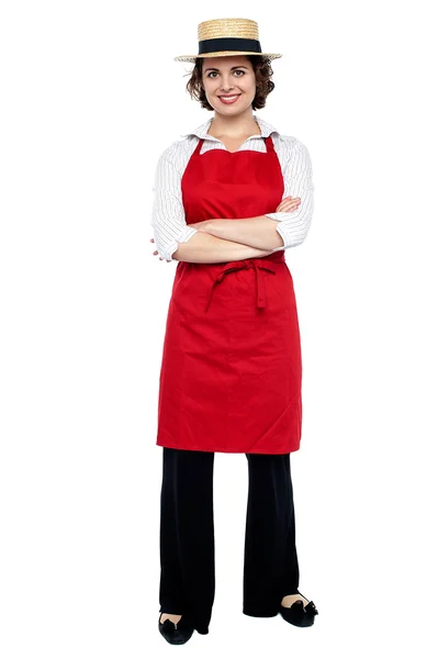 Cheerful baker woman wearing straw bowler hat — Stock Photo, Image