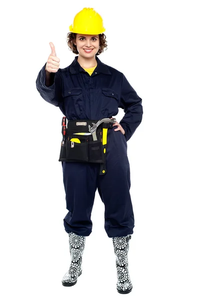 Active woman construction worker with thumb up — Stock Photo, Image