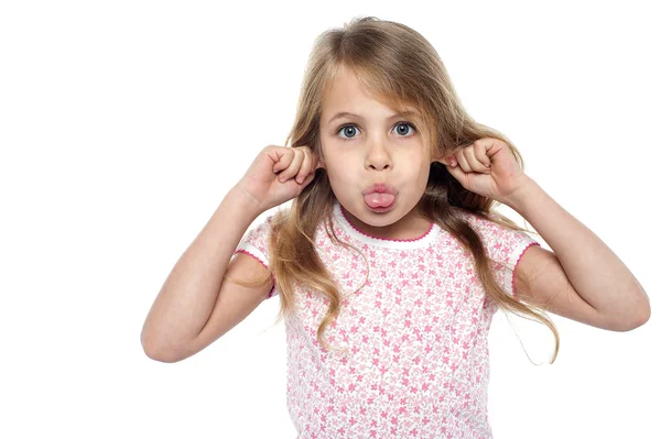 Fun loving girl child making faces — Stock Photo, Image