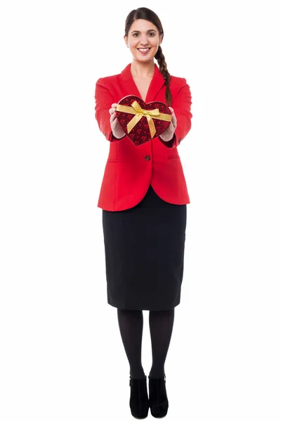 Girl showing valentine gift from her boyfriend — Stock Photo, Image