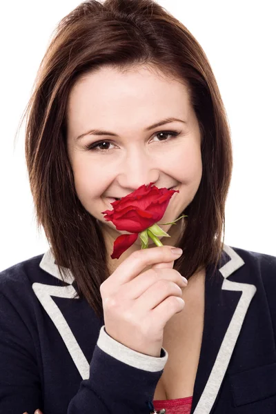 Adorável jovem com uma bela rosa vermelha — Fotografia de Stock