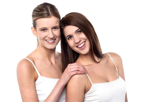 Two attractive girls posing in sleeveless spaghetti — Stock Photo, Image