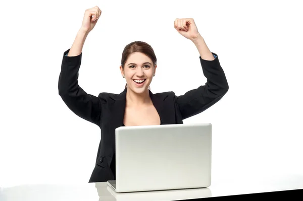 Excited businesswoman raising her arms up — Stock Photo, Image