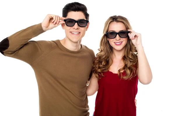 Young couple posing to camera with shades on — Stock Photo, Image