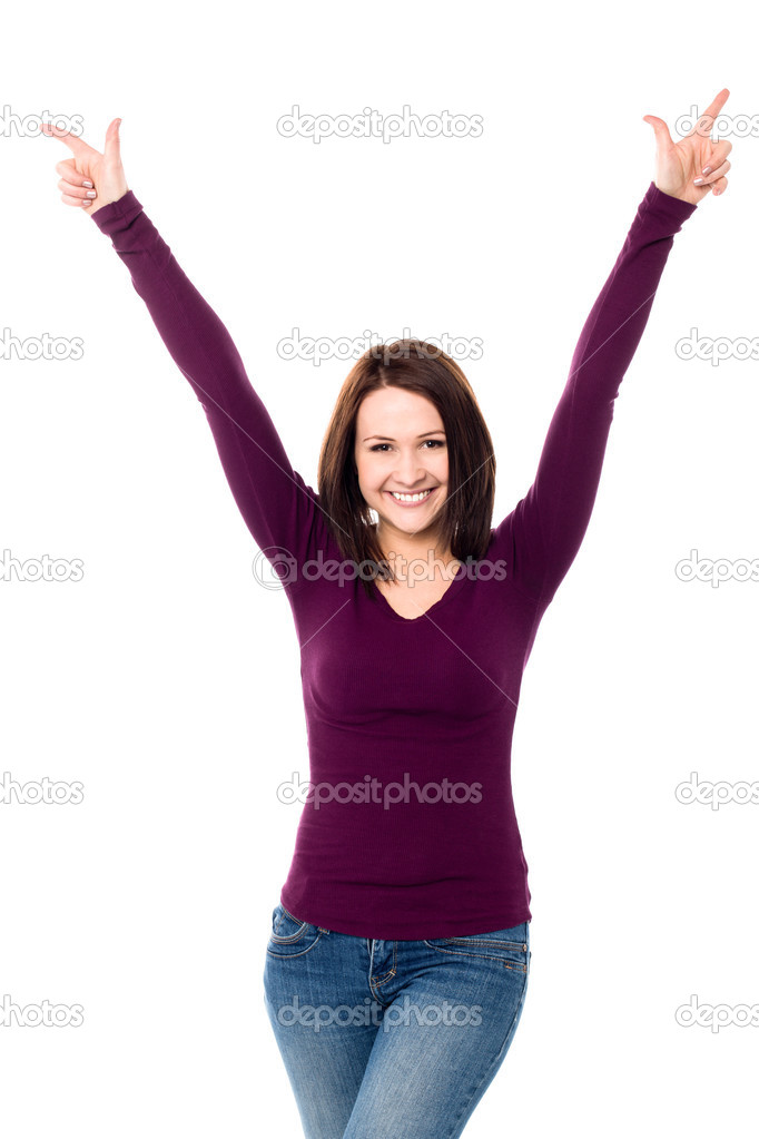 Victorious young woman celebrating her success