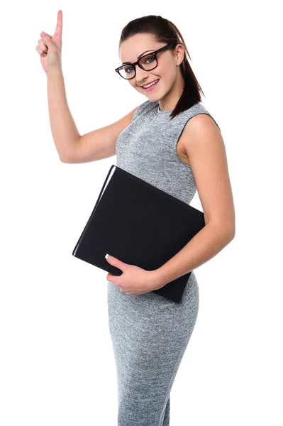 Pretty employee raising her arm up — Stock Photo, Image