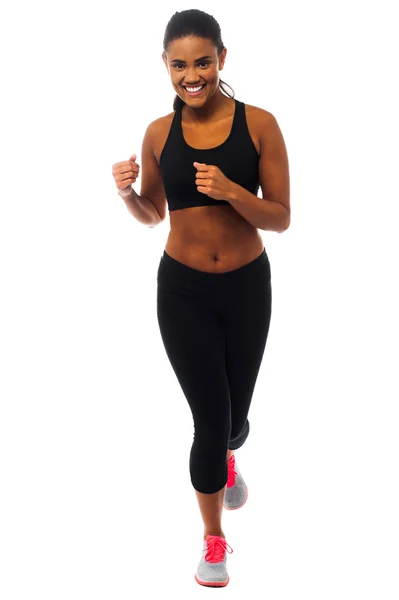 Fit female jogger, studio shot — Stock Photo, Image