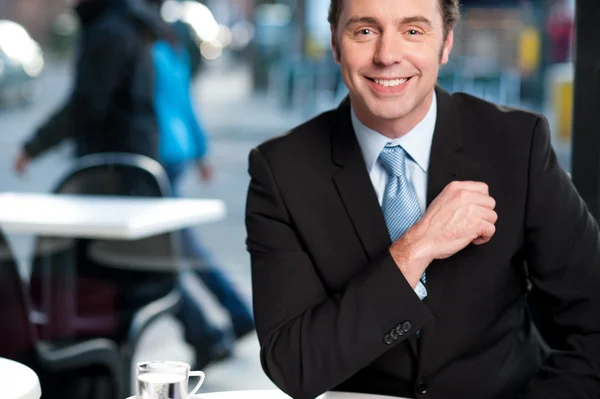 Handsome cheerful experienced businessman — Stock Photo, Image