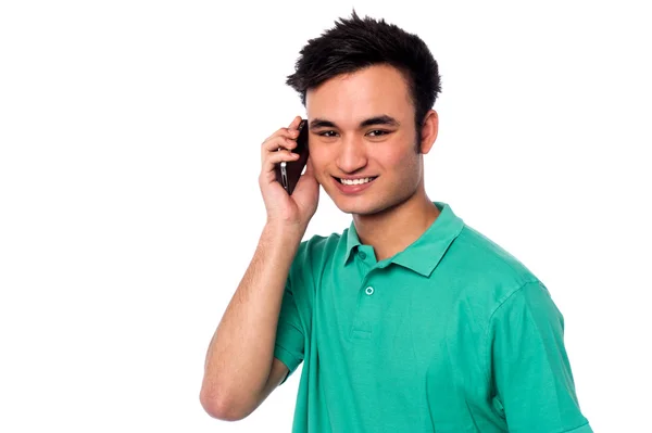 Young boy speaking over cellphone — Stock Photo, Image