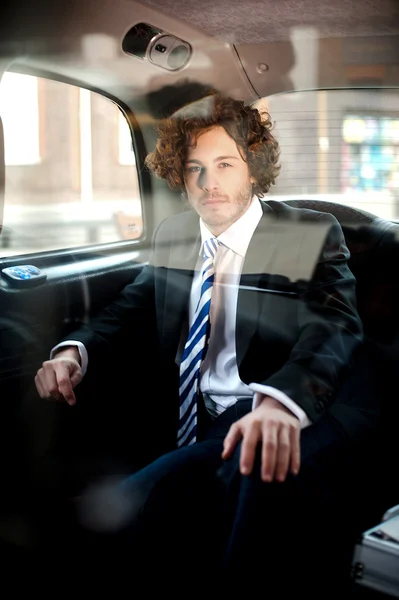 Handsome business corporate inside taxi cab — Stock Photo, Image